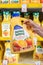 Los Angeles, CA, USA March 1st, 2022 Shoppers hand holding a Florida natural brand bottle of natural unpasteurized orange juice