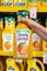 Los Angeles, CA, USA March 1st, 2022 Shoppers hand holding a Simply Orange brand bottle of natural unpasteurized orange juice in a