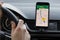 LOS ANGELES, CALIFORNIA - JUNE 6, 2019: Close up to male driving and using navigation appliction Google Maps. Get direction. An