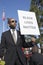 Los Angeles, California, USA, January 19, 2015, 30th annual Martin Luther King Jr. Kingdom Day Parade, black man hold sign Black
