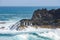 Los Hervideros, volcanic coastline with wavy ocean and blue sky, Lanzarote