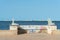 LOS NIETOS, SPAIN - 19 SEPTEMBER 2022 Seahorse sculptures on the shore of the Mar Menor lagoon, with the resort of La Manga on