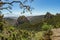 Los roques and famous Agando rock - cult place near Garajonay national park at La Gomera. Old volcanic mountain peaks. Thickets of