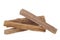 Ð¡lose up of sandalwood isolated on white background. Chandan. Sandalwood sticks