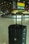 Lost black hardshell carry-on roller luggage left unattended at the baggage reclaim area at airport