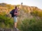 Lost male tourist on a natural background. Lost man trying to call a phone. Bad internet connection concept. Copy space.