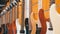 Lot of electric guitars hanging in a music store. Shop musical instruments
