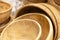 A lot of empty clean organic ecology wooden bowls. Natural dish and tableware.