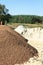 A lot of expanded clay in a pile on the construction site