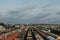 A lot of freight rail cars, a cargo distribution station. Staging post. Large parking of trains