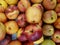 lot of fruits of nectarine, textured background