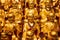 A lot of gold statues of the Lohans in Longhua Temple in Shanghai, China. Famous buddhist temple in China
