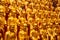 A lot of gold statues of the Lohans in Longhua Temple in Shanghai, China. Famous buddhist temple in China