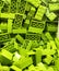 A lot of Green plastic Lego blocks.