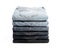 Lot of grey used women jeans stacked in a pile isolated on white