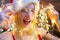 Lot of lights. Christmas celebration. Love peace and joy for whole year. Girl santa hat christmas party. Girl celebrate