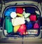 lot of luggage in the family car with vintage effect