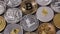 A lot of metal coins of crypto currency LTC, ETH, BTC, XMR, XRP, DASH on a dark background. Slow motion. 1080p Full HD