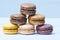 Lot of milticolored french macaroons, close-up