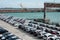 A lot of new cars toyota corolla and Subaru Forester are unloaded at the seaport