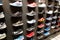 A lot of new modern shoes on the wall