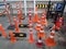Lot of parking traffic cones and limiting driving speed barriers at hardware store