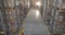 A lot of people work in stock. Panoramic view of a modern warehouse, many people do the work