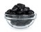 Lot of prunes in transparent glass bowl