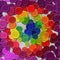 A lot of rainbow multi colored vintage plastic buttons randomly scattered on the gray background - top view