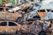 A lot of rusty burnt cars in Irpen, after being shot by the Russian military. Russia`s war against Ukraine. Cemetery of destroyed