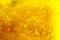 Lot of small bubbles on an yellow background, macro shot of liquid soap, macro shot of glass with beer, macro shot of cocktail