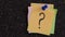 A lot of sticky notes with a Question mark on them pinned onto a cork board