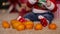 A lot of tangerines at the feet of a little smart kid during a photo shoot for the new year