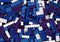 Lot of white, cyan, blue and purple Lego bricks background