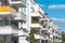 Lots of balconies of modern apartment houses