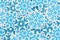 Lots of blue snowflakes winter background