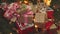 lots of Christmas presents craft paper boxes red bows ribbon fir tree lights