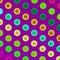 Lots of colored dots on a violet  background.