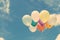 Lots of colorful balloons on the blue sky, concept of love in summer and valentine, wedding honeymoon.