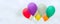 Lots of colorful balloons on the blue sky, concept of love in summer and valentine, wedding honeymoon - Panoramic banner.
