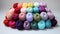 Lots of colorful balls of knitting thread.