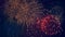 Lots of colorful bursts in a night sky. Multicolored fireworks burst, during a patriotic holiday.