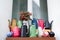 Lots of colorful watering cans of different sizes as decoration and for sale at the gardening festival