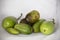 Lots of cucumbers and eggplants together on a white background