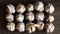 Lots of garlic top view on wooden background