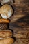 Lots of loaves of fresh bread and different ingredients. Bread and wheat, flour