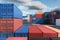 Lots of long cargo containers stacked at the terminal port for import export business. Logistics, unloading, loading, storage,