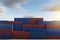 Lots of long cargo containers stacked at the terminal port for import export business. Logistics, unloading, loading, storage,