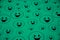 Lots of mint green smiling big and small smileys