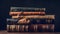 Lots of old leather-bound books in one stack on a dark background.